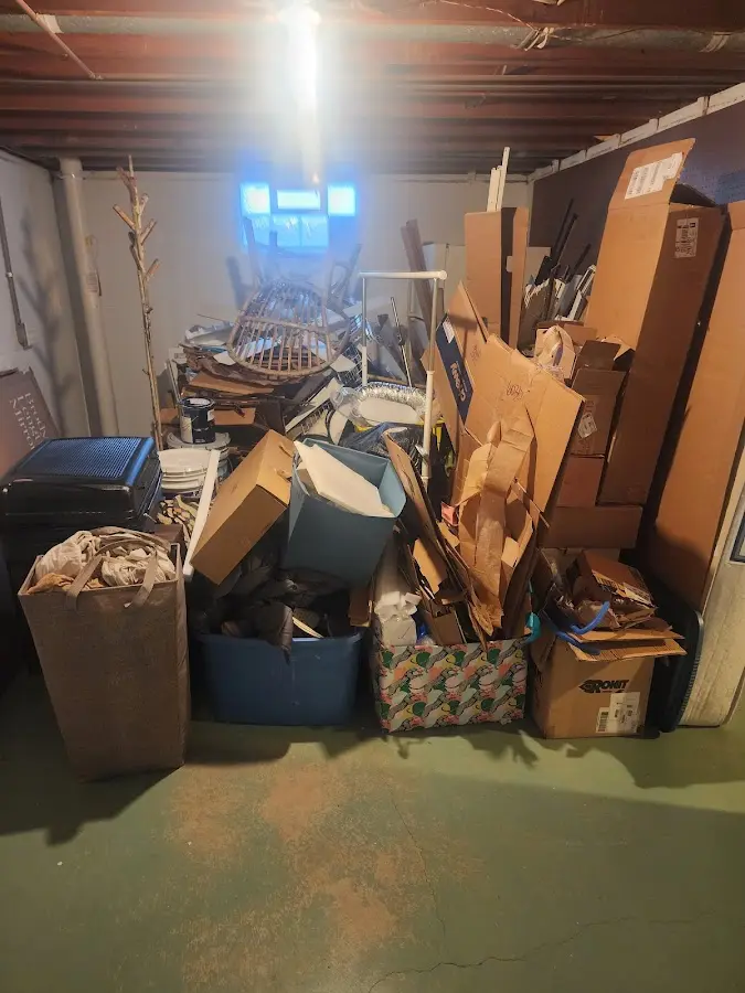 Roll-off dumpster container at job site for 15 Yard Dumpster Rental in Fort Stewart